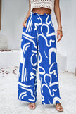 Smocked Printed Wide Leg Pants with Pockets - LACEDUPED