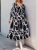 Perfee Smocked Printed Long Sleeve Midi Dress