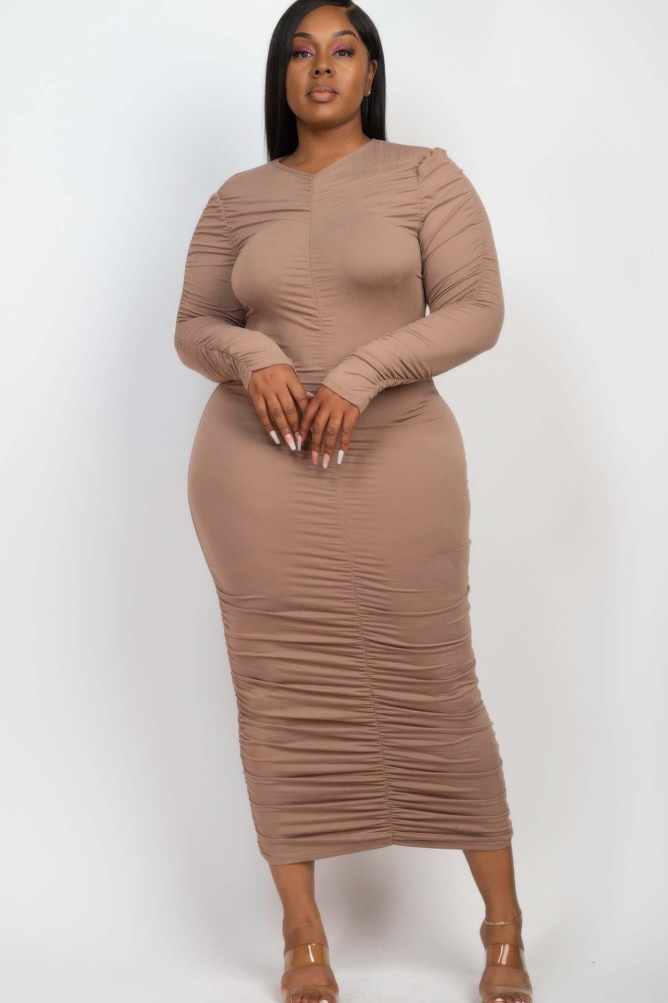 Plus Size Ruched Long Sleeve Midi Dress in beige color enhancing curves with comfort and chic style.