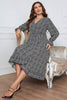 Honey Melo Apparel Plus Size Printed V-Neck Flounce Sleeve Midi Dress