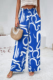 Smocked Printed Wide Leg Pants with Pockets - LACEDUPED