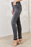 Judy Blue Full Size High Waist Tummy Control Release Hem Skinny Jeans - Premium   - Just $93.95! Shop now at LACEDUPED