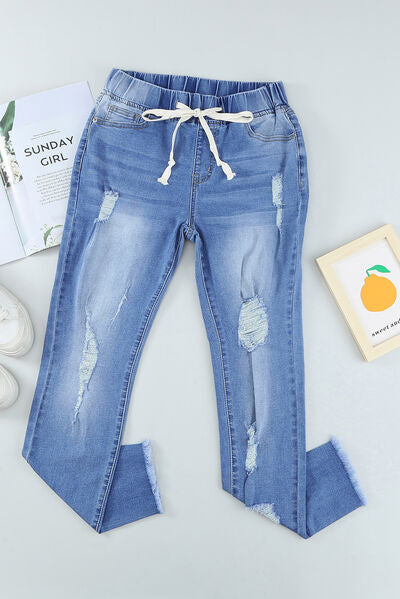 Drawstring Distressed Raw Hem Jeans with Pockets - Premium   - Just $72.95! Shop now at LACEDUPED